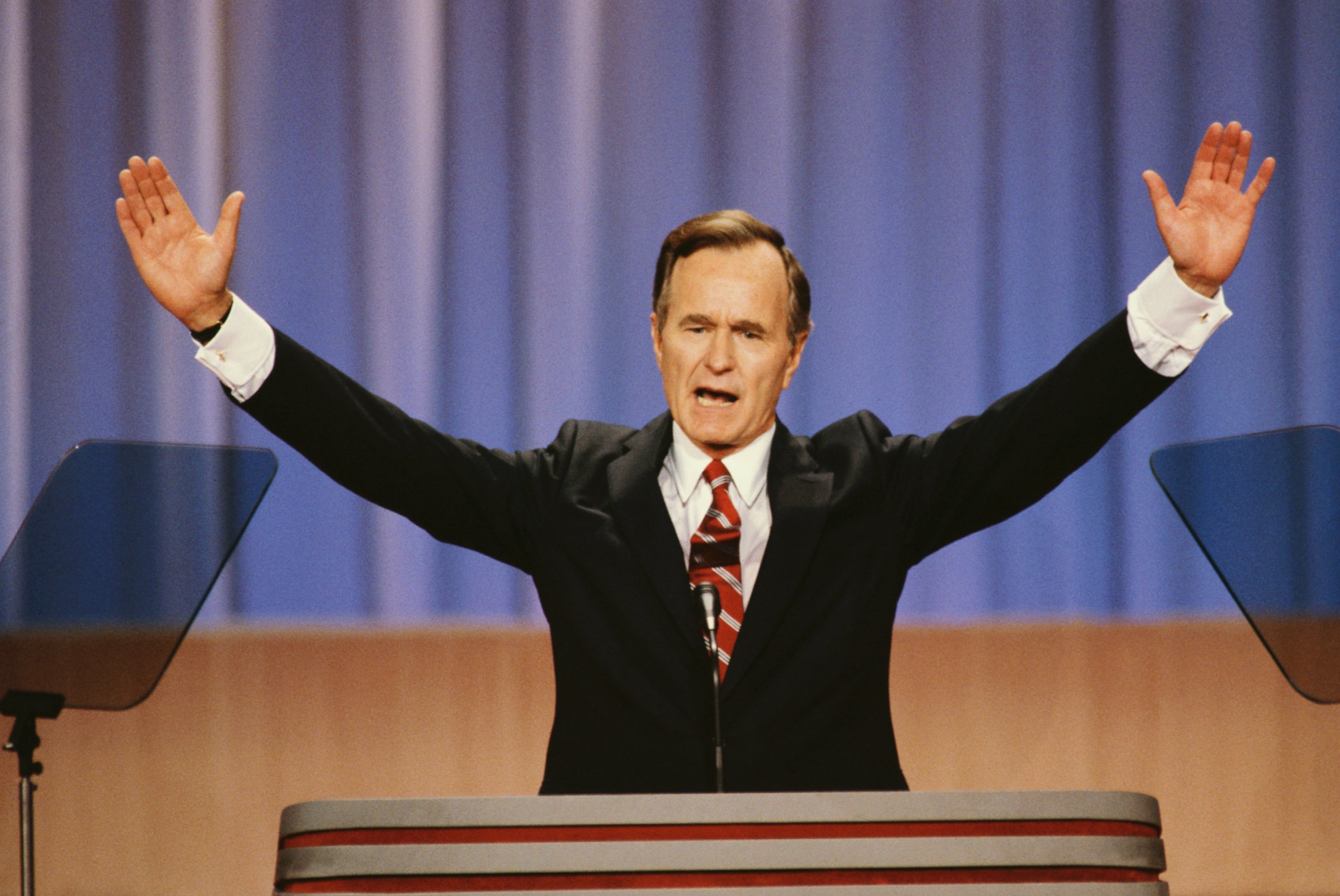 PHOTO: Vice President George Bush raises his arms during a speech at the 1988 Republican National Convention in New Orleans.