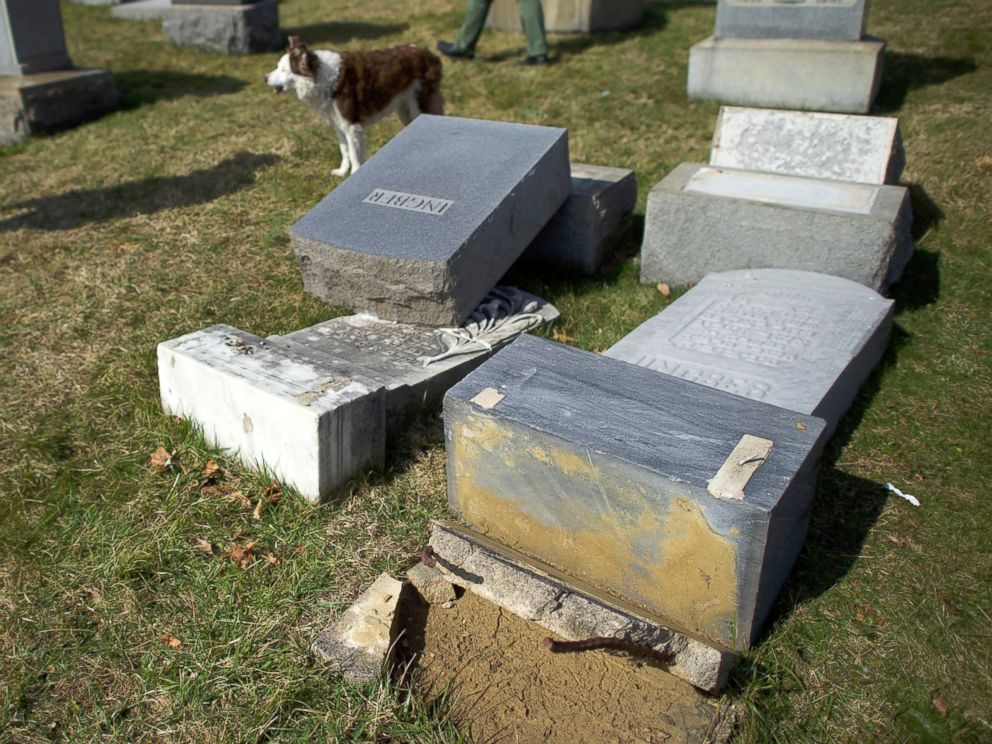 PHOTO: A dog walks past vandalized Jewish tombstones at Mount Carmel Cemetery, Feb. 27, 2017, in Philadelphia, Pennsylvania.