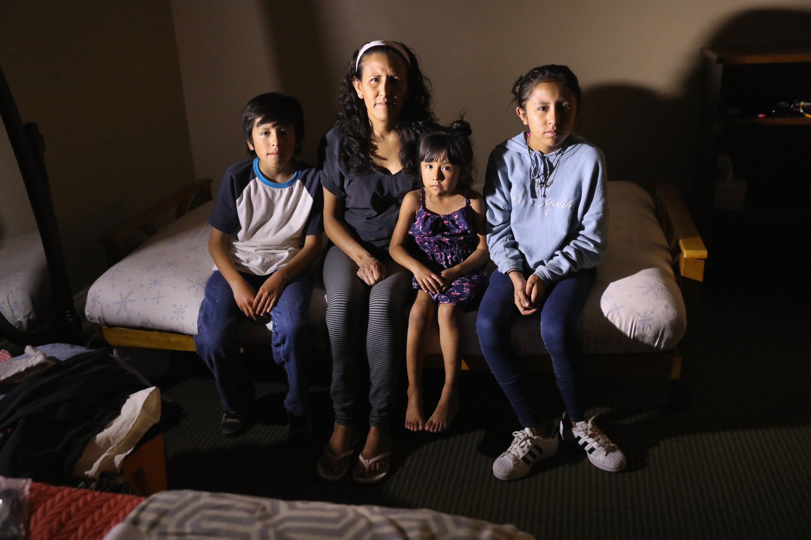 PHOTO: Jeanette Vizguerra, 45, sits with her U.S.-born children, Roberto, 10, Zury, 6, and Luna, 12 while taking sanctuary at the First Baptist Church, May 5, 2017, in Denver. 