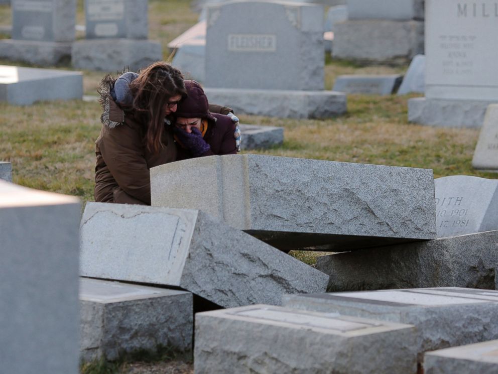 PHOTO: Melanie Steinhardt comforts Becca Richman at the Jewish Mount Carmel Cemetery, Feb. 26, 2017, in Philadelphia.