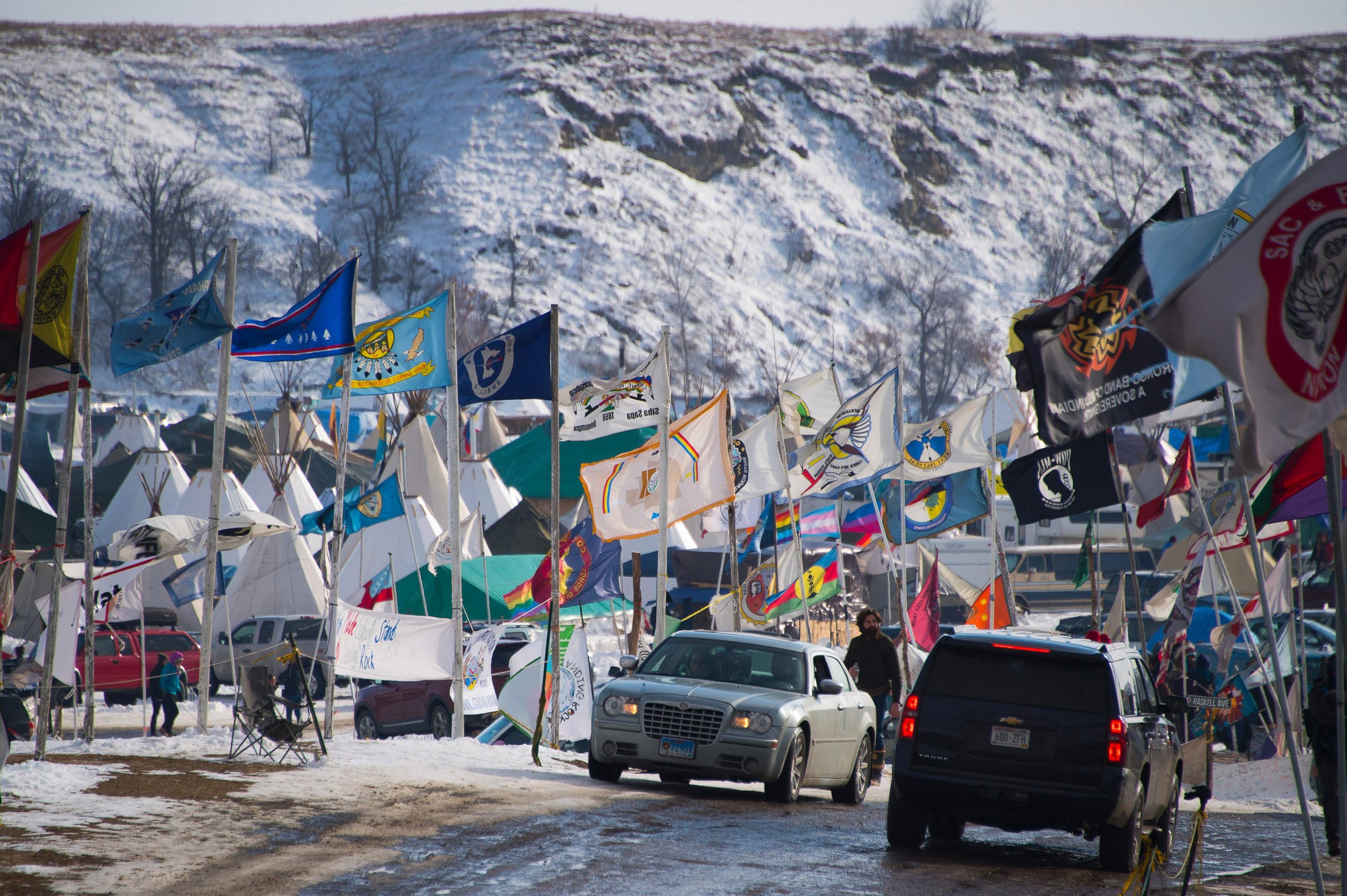 PHOTO: Flags flap in the wind on the main thoroughfare of Oceti Sakowin Camp on the edge of the Standing Rock Sioux Reservation, Dec. 3, 2016 outside Cannon Ball, North Dakota.