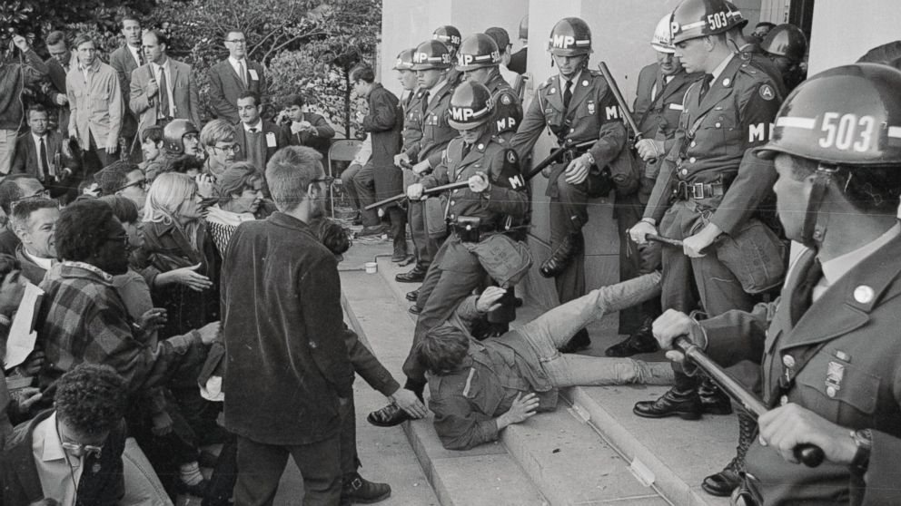 PHOTO: A peace demonstrator is knocked to the ground as he tries to break through police lines at the entrance to the Pentagon during an anti-Vietnam rally i Washington, Oct. 21, 1967.