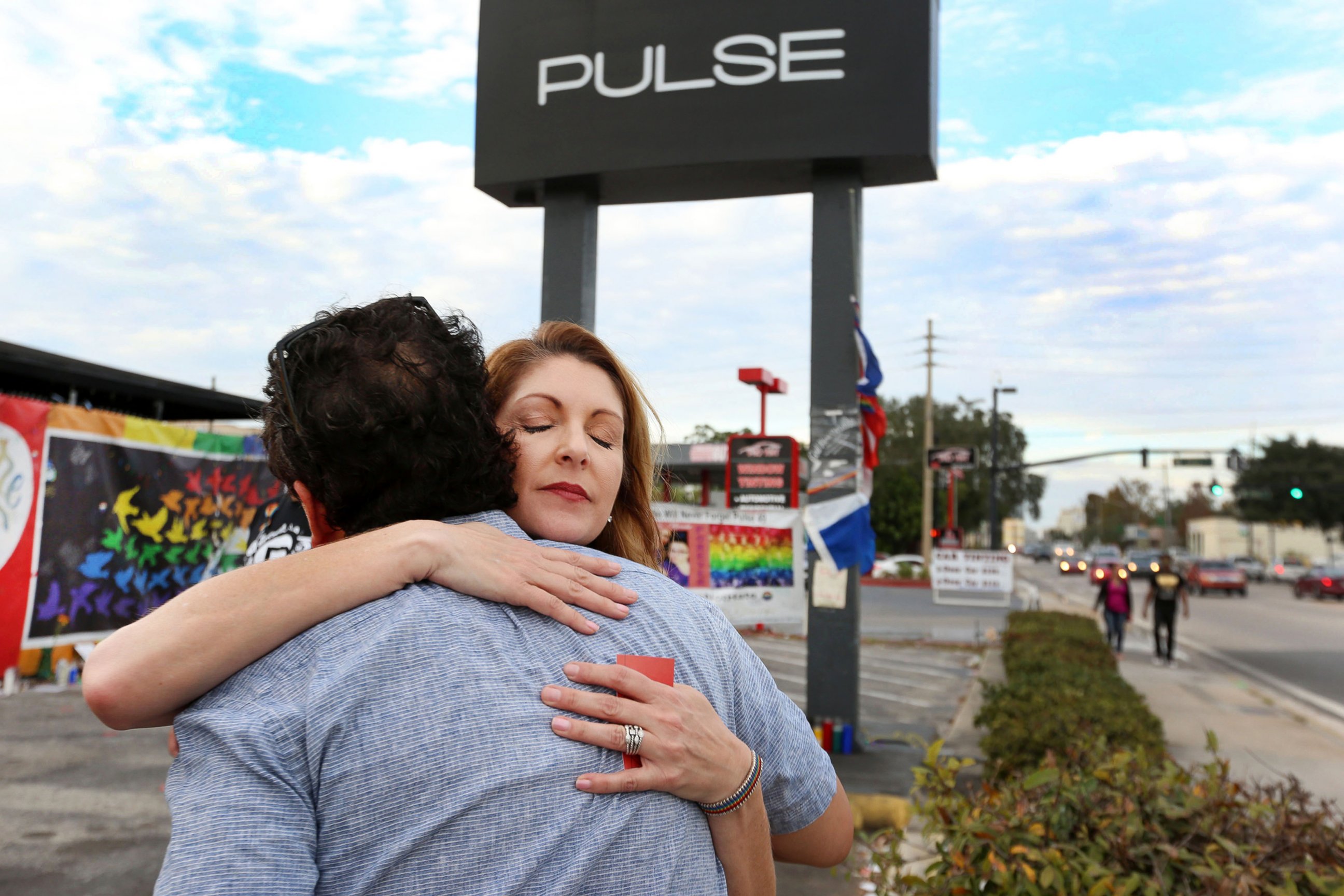 PHOTO: Barbara Poma, right, the owner of the Pulse Nightclub, is hugged, Dec. 5, 2016, in front of the club after a press conference.