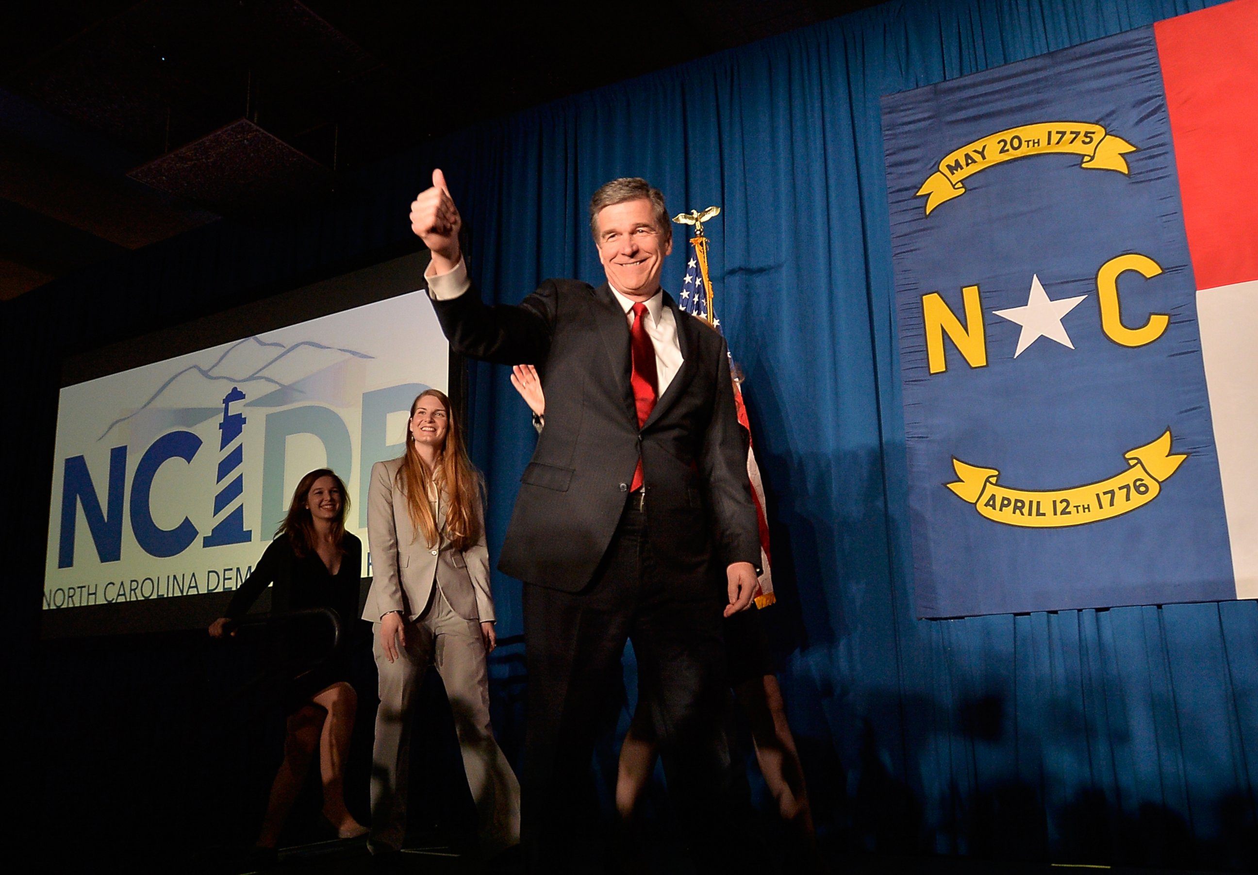 PHOTO: North Carolina Governor-elect Roy Cooper waves to a crowd at the North Carolina Democratic Watch Party, Nov. 9, 2016, in Raleigh, North Carolina.