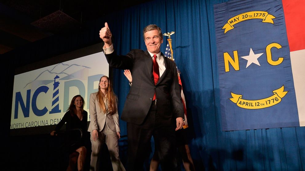 PHOTO: North Carolina Governor-elect Roy Cooper waves to a crowd at the North Carolina Democratic Watch Party, Nov. 9, 2016, in Raleigh, North Carolina.