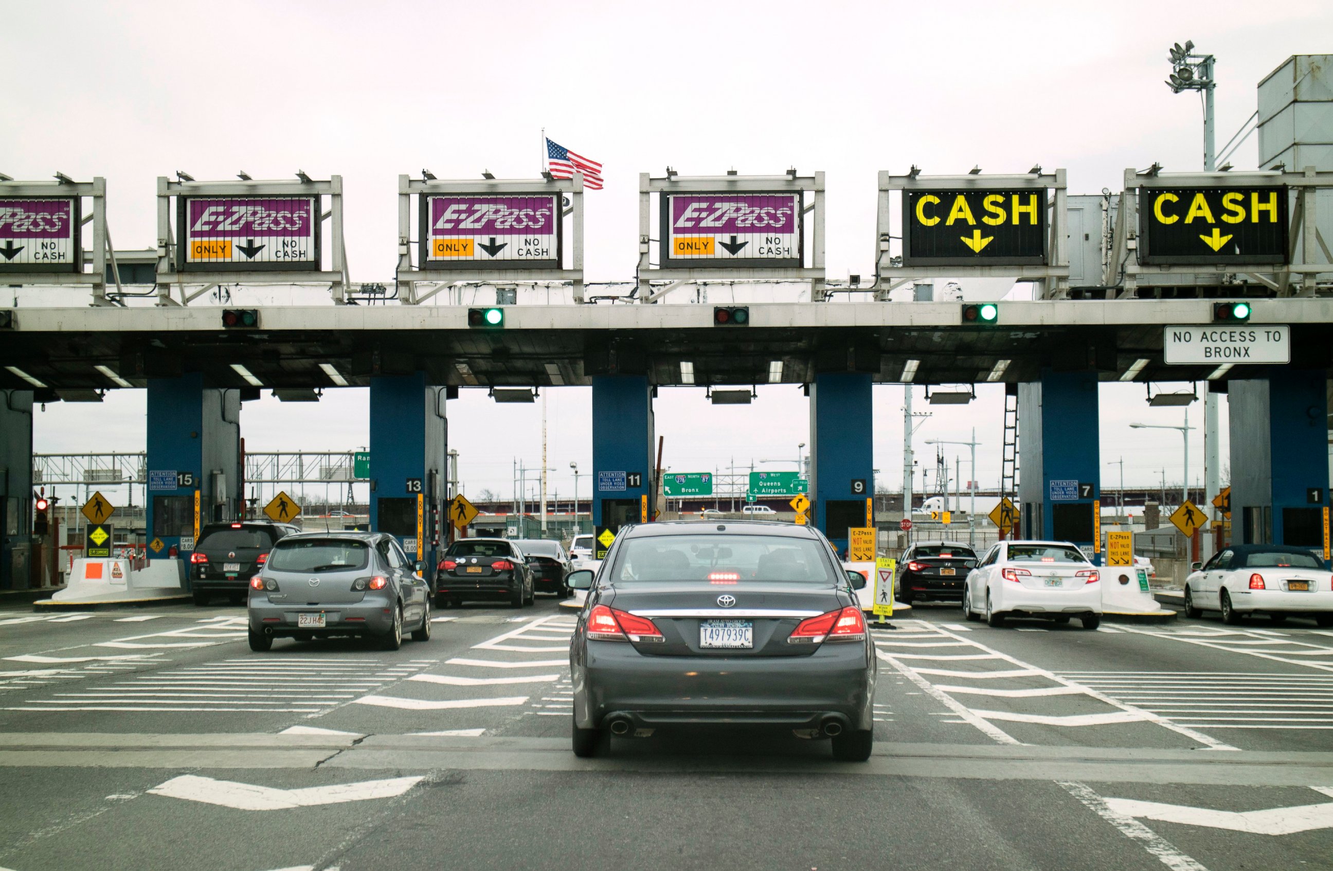 PHOTO: Cars queue at a toll plaza on the Robert F. Kennedy bridge in New York.