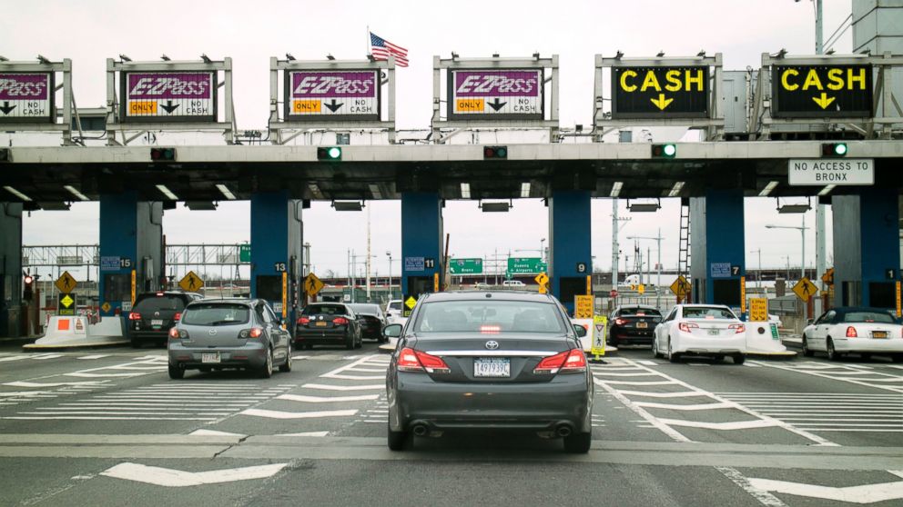 PHOTO: Cars queue at a toll plaza on the Robert F. Kennedy bridge in New York.