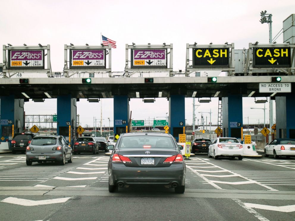 PHOTO: Cars queue at a toll plaza on the Robert F. Kennedy bridge in New York.