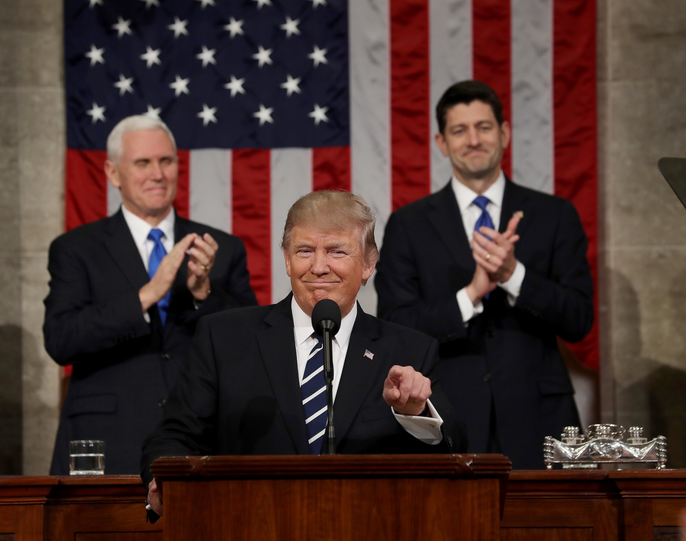 PHOTO: Vice President Mike Pence and Speaker of the House Paul Ryan applaud as President Donald  Trump delivers his first address to a joint session of Congress, Feb. 28, 2017, in Washington.