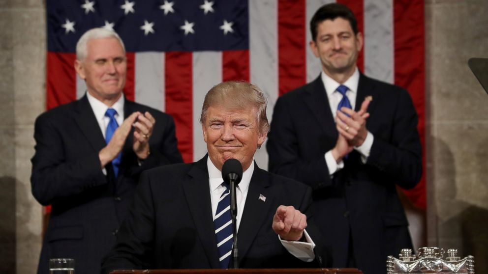 PHOTO: Vice President Mike Pence and Speaker of the House Paul Ryan applaud as President Donald Trump delivers his first address to a joint session of Congress, Feb. 28, 2017, in Washington.