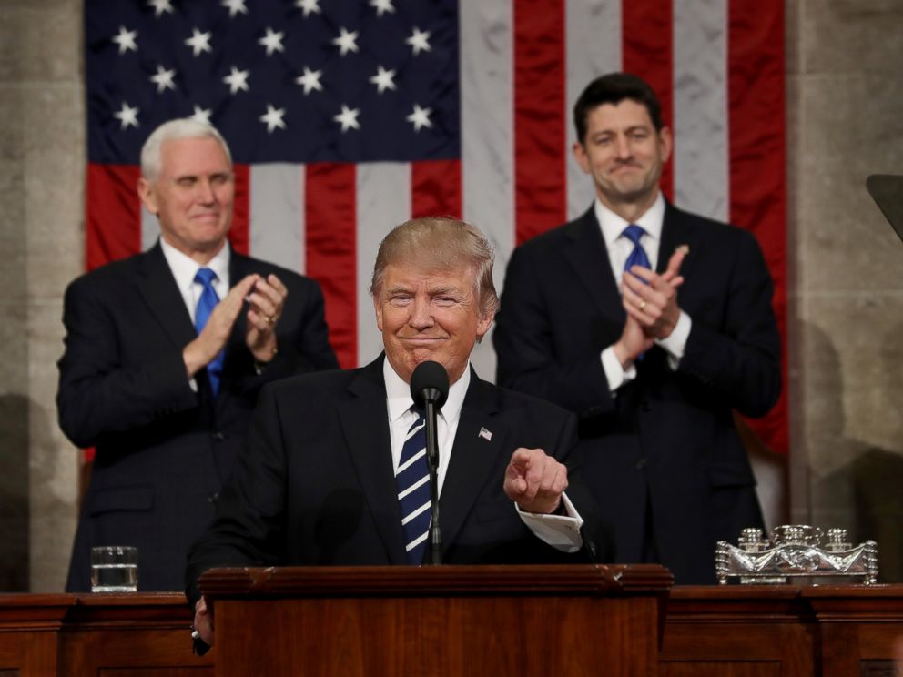 PHOTO: Vice President Mike Pence and Speaker of the House Paul Ryan applaud as President Donald Trump delivers his first address to a joint session of Congress, Feb. 28, 2017, in Washington.