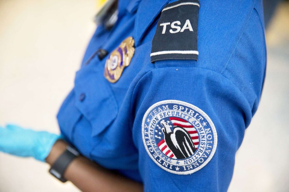   PHOTO: An Officer of the Transportation Safety Administration stands in the Pre-Check Zone at Dulles International Airport in Dulles, Virginia on August 19, 2015. 