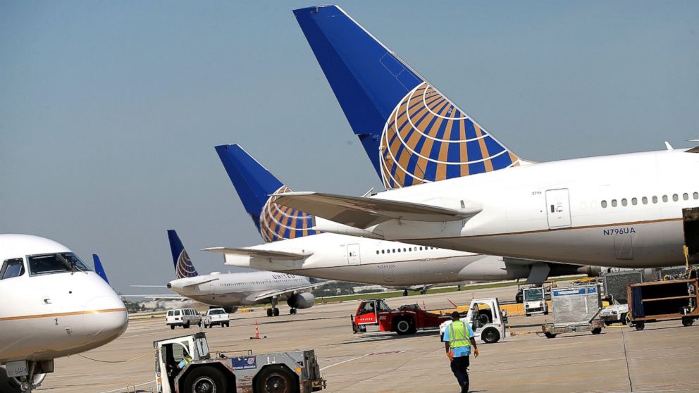 United Airlines jets sit at gates at O'Hare International Airport, Sept. 19, 2014, in Chicago.