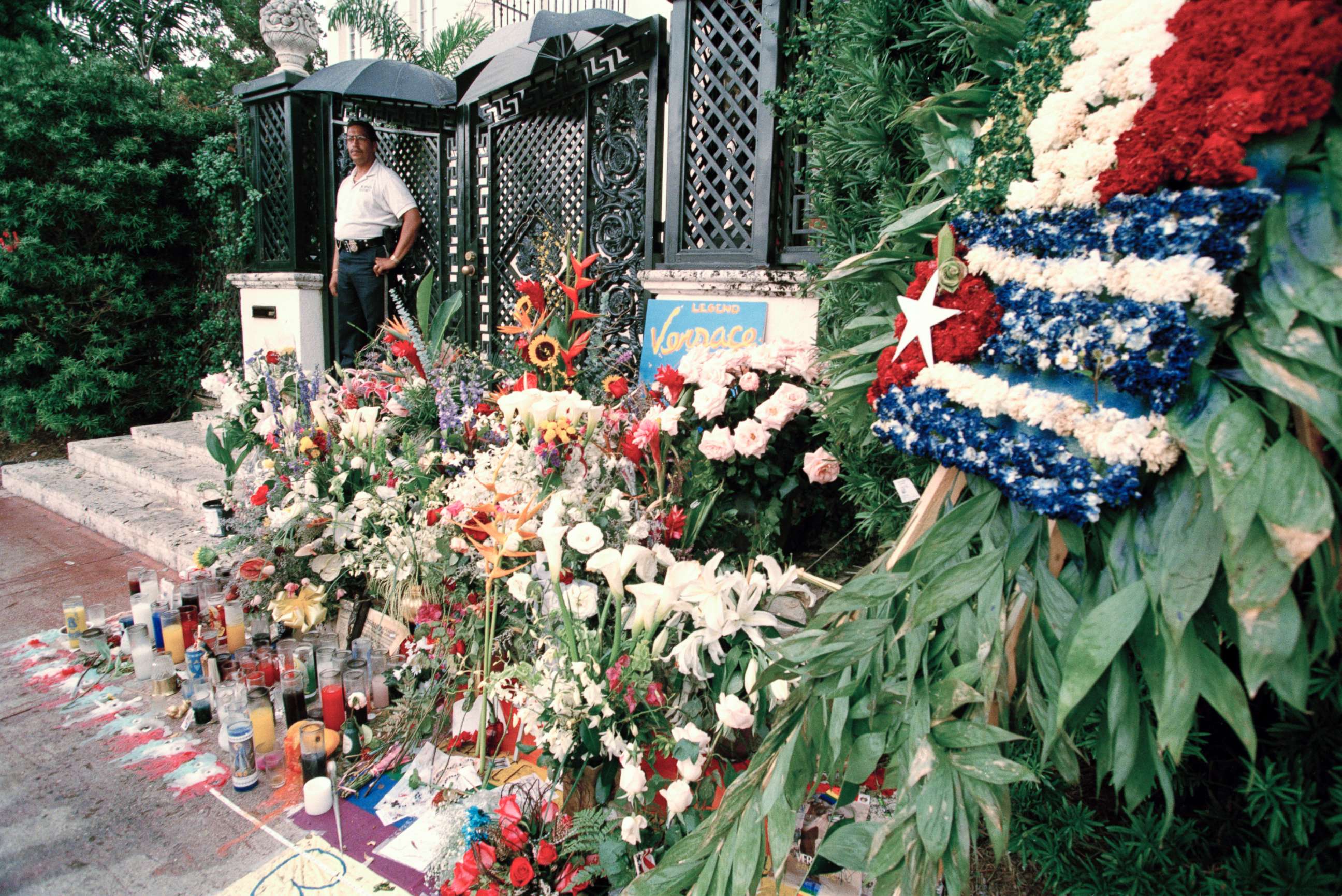 PHOTO: Floral tributes after the murder of Italian fashion designer Gianni Versace outside his Miami Beach home, July 1997. 