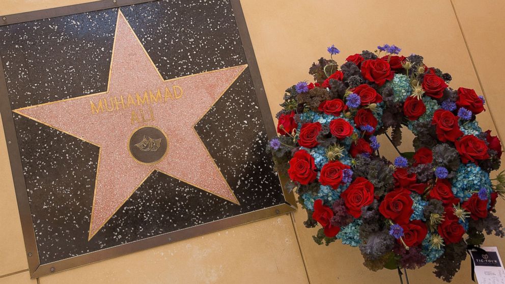 Flowers are placed at Muhammad Ali's star on the Hollywood Walk of Fame on June 4, 2016 in Hollywood, California. Sports legend Muhammad Ali died June 3rd at the age of 74. 