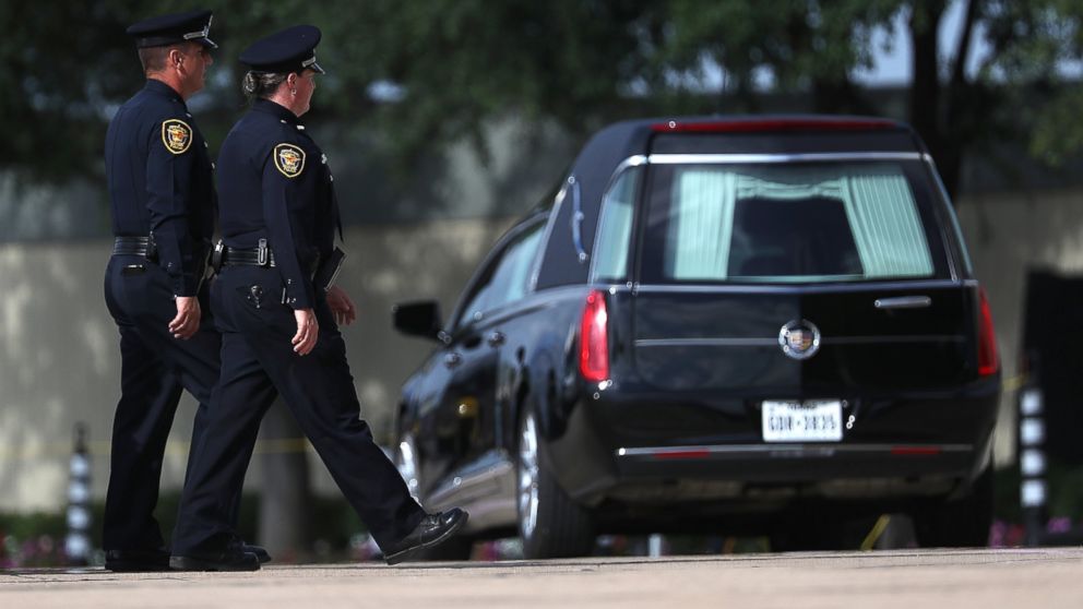 PHOTO: Police officers arrive at a funeral service for slain Dallas Area Rapid Transit (DART) police officer Brent Thompson at the Potter House Church on July 13, 2016 in Dallas.