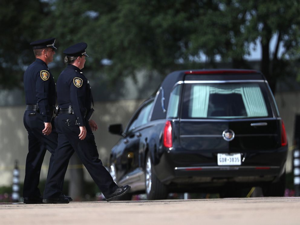 PHOTO: Police officers arrive at a funeral service for slain Dallas Area Rapid Transit (DART) police officer Brent Thompson at the Potter House Church on July 13, 2016 in Dallas.