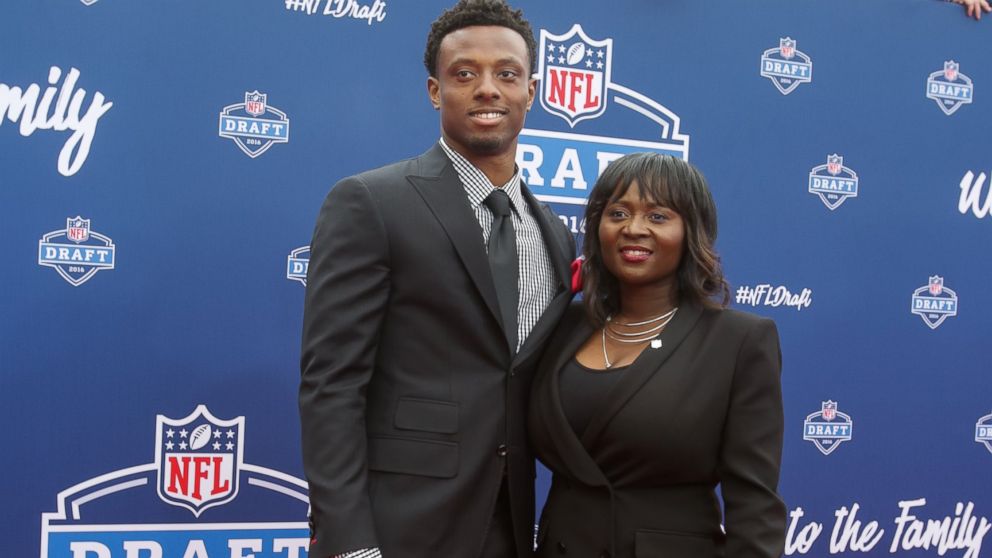 Eli Apple of Ohio State and his mother Annie arrive to the 2016 NFL Draft at the Auditorium Theatre of Roosevelt University on April 28, 2016 in Chicago, Illinois.  