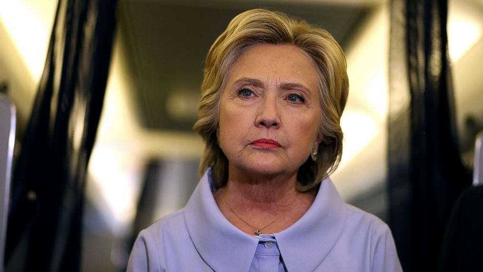 Democratic presidential nominee Hillary Clinton meets with reporters on her campaign plane enroute to Iowa, on Sept. 5, 2016. 