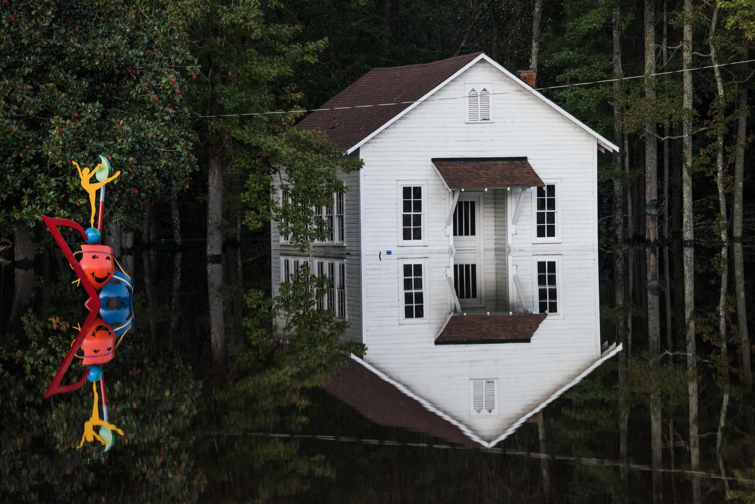 PHOTO: A building is inundated with floodwaters on Oct. 10, 2016, in Lumberton, North Carolina. 