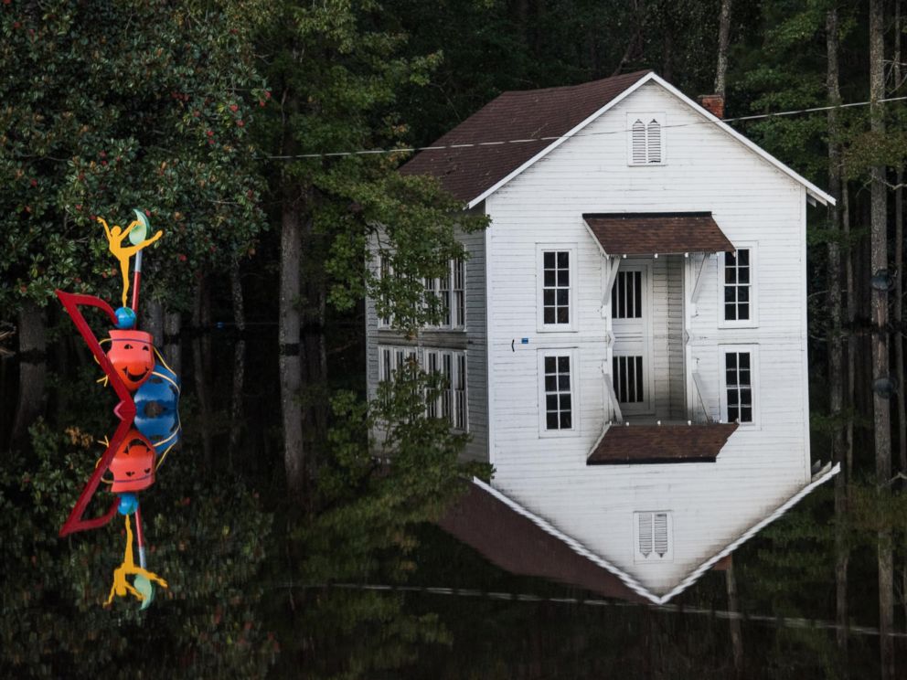 PHOTO: A building is inundated with floodwaters on Oct. 10, 2016, in Lumberton, North Carolina.