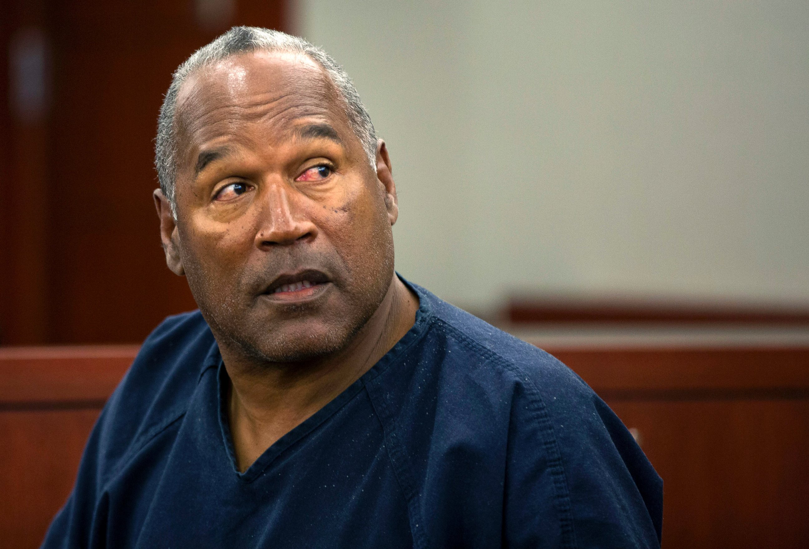 PHOTO: O.J. Simpson waits to continue testifying after a break in an evidentiary hearing in Clark County District Court May 15, 2013 in Las Vegas.