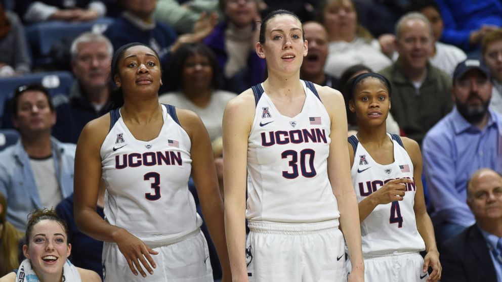 Connecticut's Morgan Tuck (3), Breanna Stewart (30) and Moriah Jefferson (4) look on amid an 80-40 win against Tulane at Gampel Pavilion in Storrs, Conn., on Feb. 27, 2016.