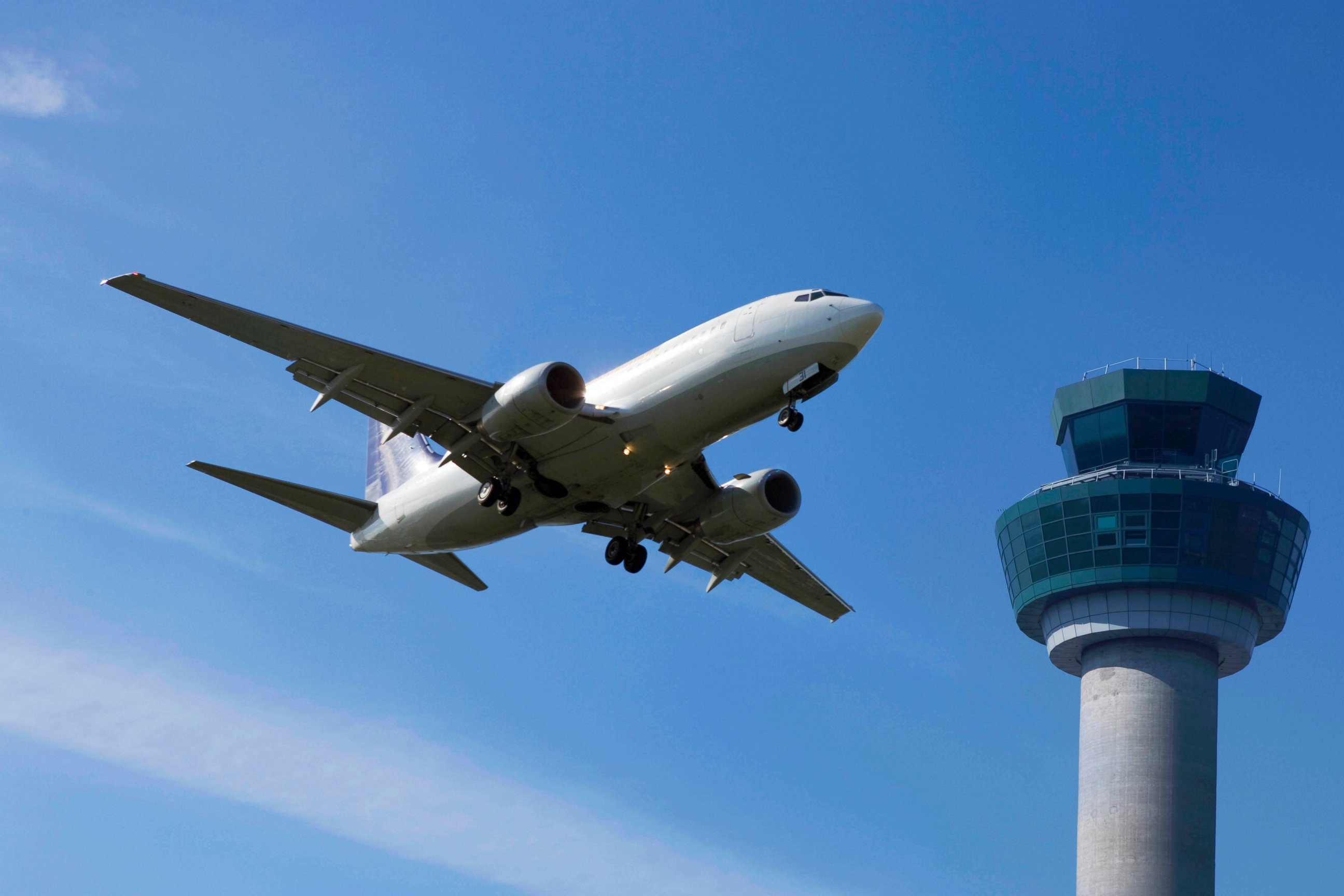 PHOTO: A plane flies past a control tower in this file photo.