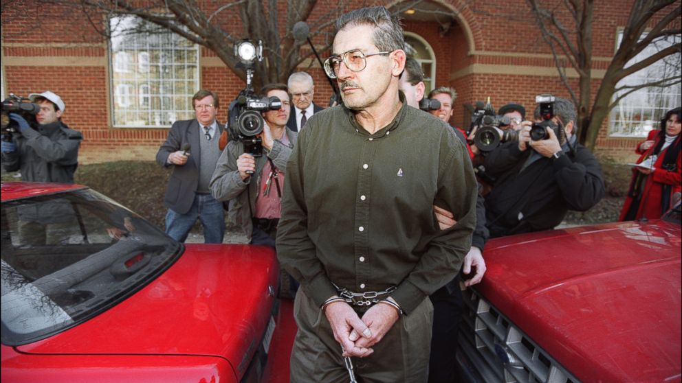 PHOTO: Former senior CIA office Aldrich Hazen Ames is led from U.S. Federal Courthouse in Alexandria, Feb 22, 1994, after being arraigned on charges of spying for the former Soviet Union. 
