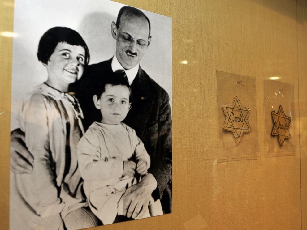 PHOTO: A photograph of Otto Frank with his daughters Anne, center, and Margaret, left, with yellow stars worn by Dutch Jews is shown over a display of documents discovered in the YIVO Institute for Jewish Research archives, Feb. 14, 2007, in New York.