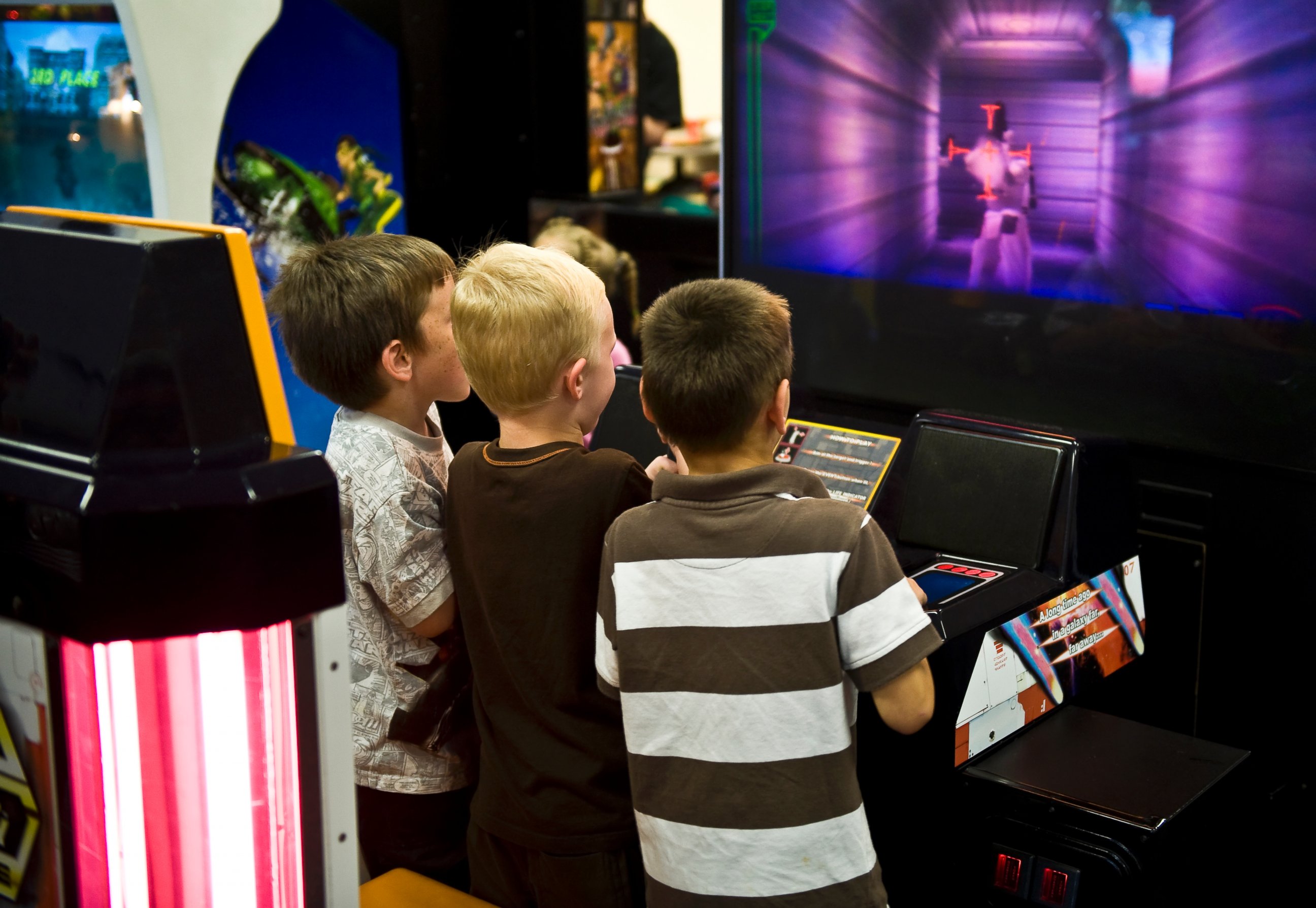 PHOTO: Boys playing a video game in an arcade are seen in this undated file photo.