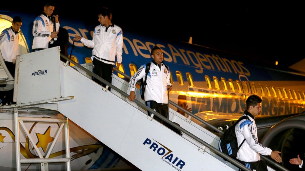 PHOTO: Players of Argentina arrive at Tancredo Neves International Airport ahead of the 2014 FIFA World Cup, June 9, 2014, in Belo Horizonte, Brazil.
