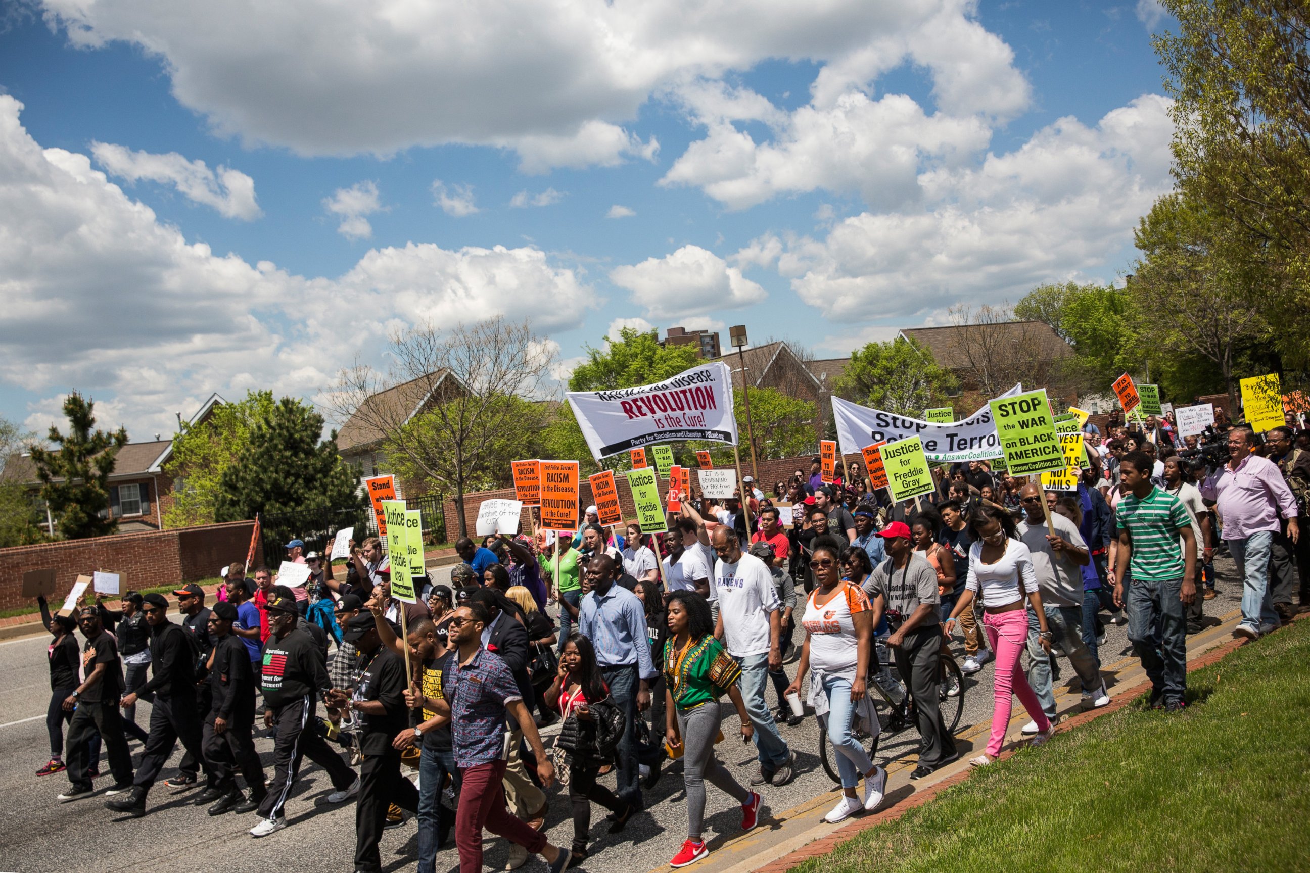 PHOTO: Protesters march from the Gilmor Homes, where Freddie Gray was arrested, to City Hall on May 2, 2015 in Baltimore, Md.