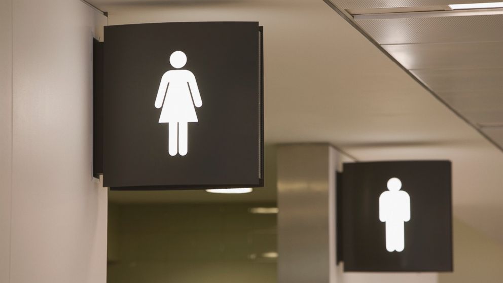 Signs for a Women's and a Men's bathrooms are seen in this undated file photo.