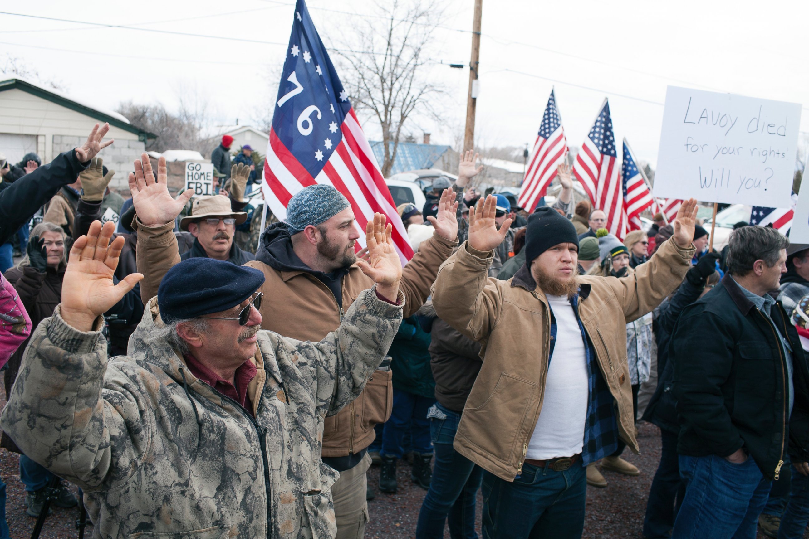 PHOTO: Anti-government protesters raise their arms in the air and shout "hands up don't shoot" outside the Harney County Courthouse on Feb. 1, 2016 in Burns, Oregon. 