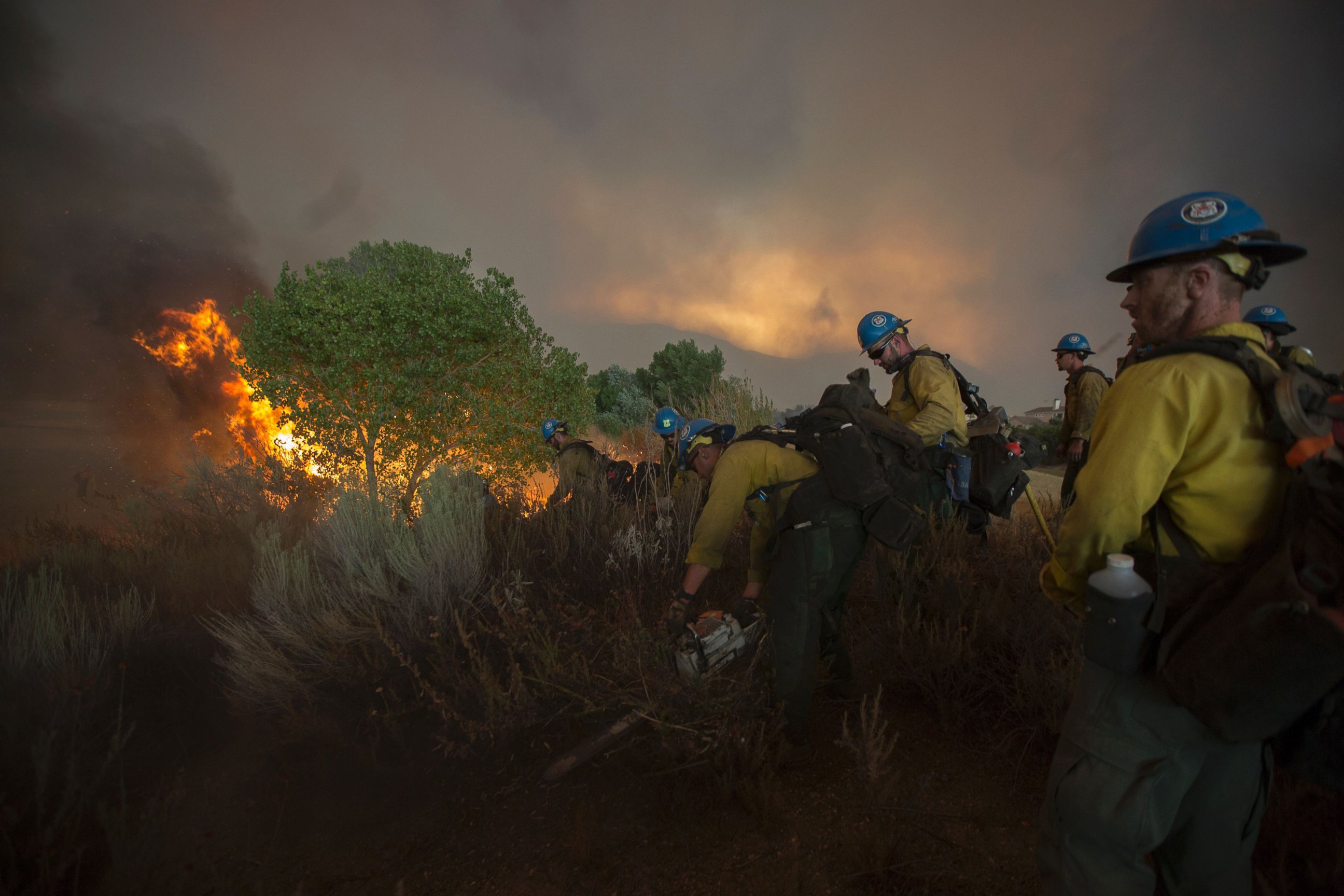 PHOTO: Firefighters of the Texas Canyon Hotshot crew fight the Sand Fire, July 23 2016 near Santa Clarita, California.