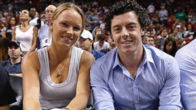 PHOTO: Caroline Wozniacki and Rory McIlroy watch a game between the Miami Heat and Washington Wizards, Dec. 15, 2012, in Miami, Fla.