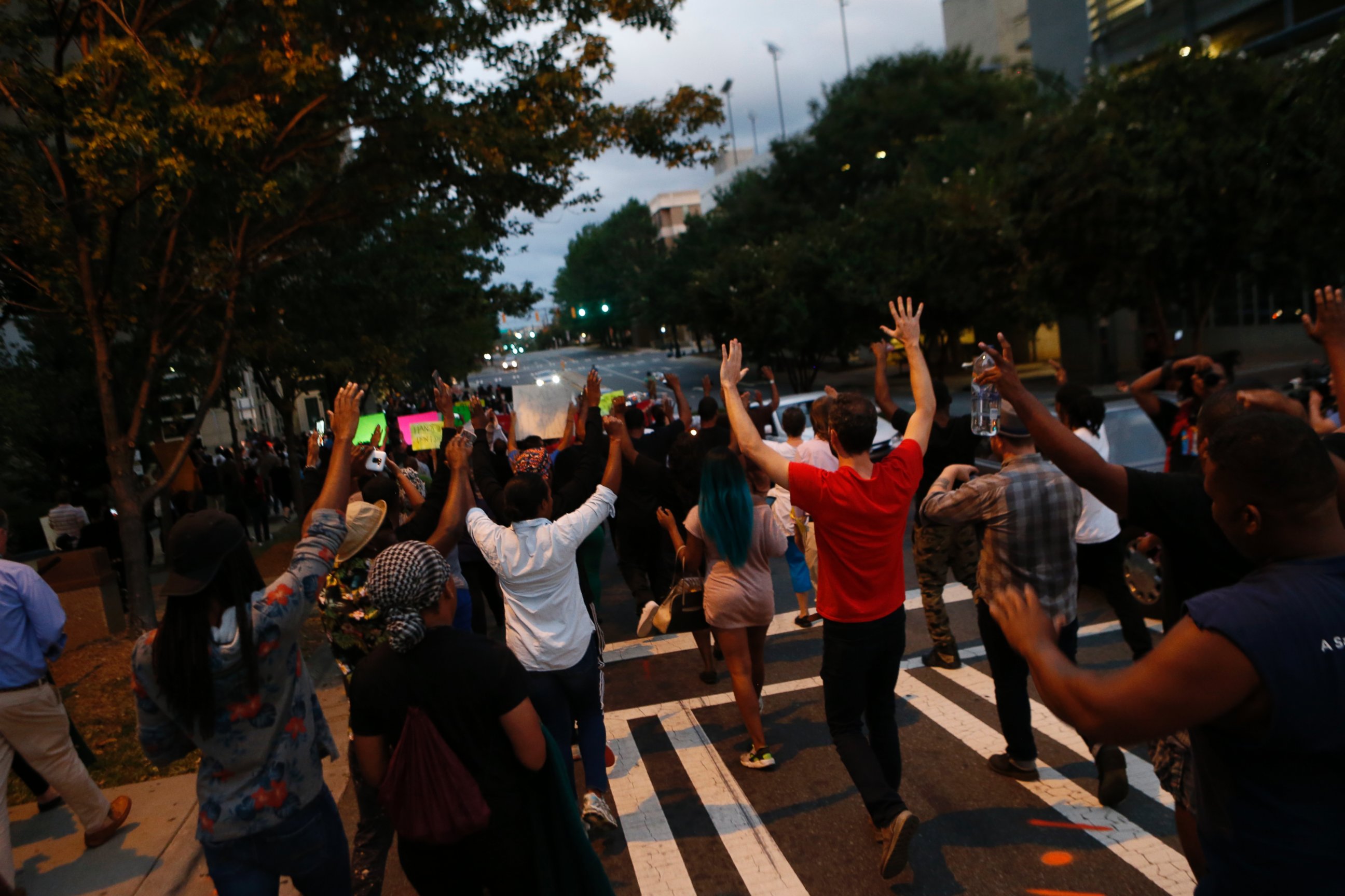 PHOTO: Residents gather for a vigil and march to protest the death of Keith Scott Sept. 21, 2016 in Charlotte, North Carolina. 