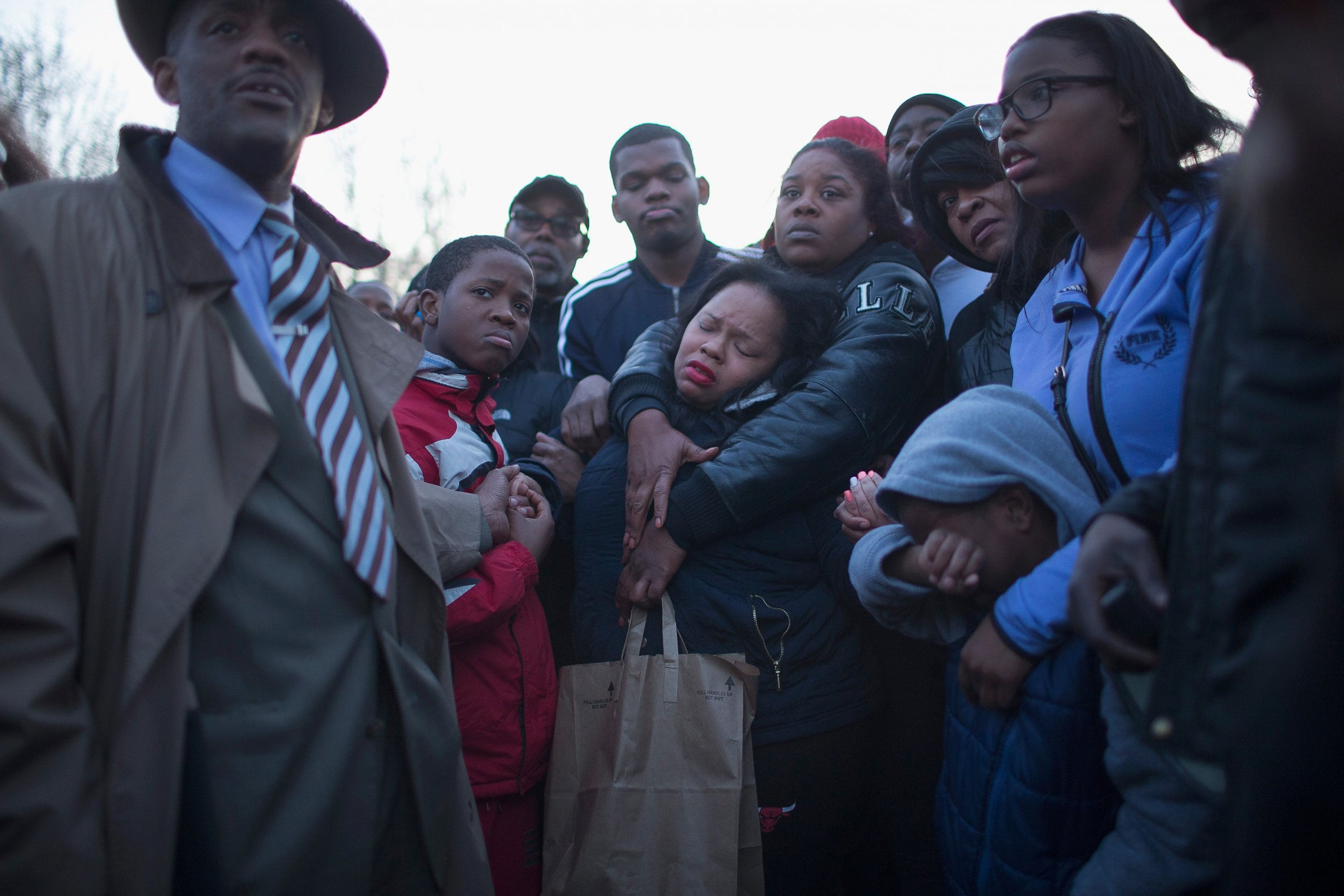PHOTO: Tambrasha Hudson, center, is comforted as she joins demonstrators protesting the shooting death of her son, 16-year-old Pierre Loury, April 12, 2016, in Chicago.