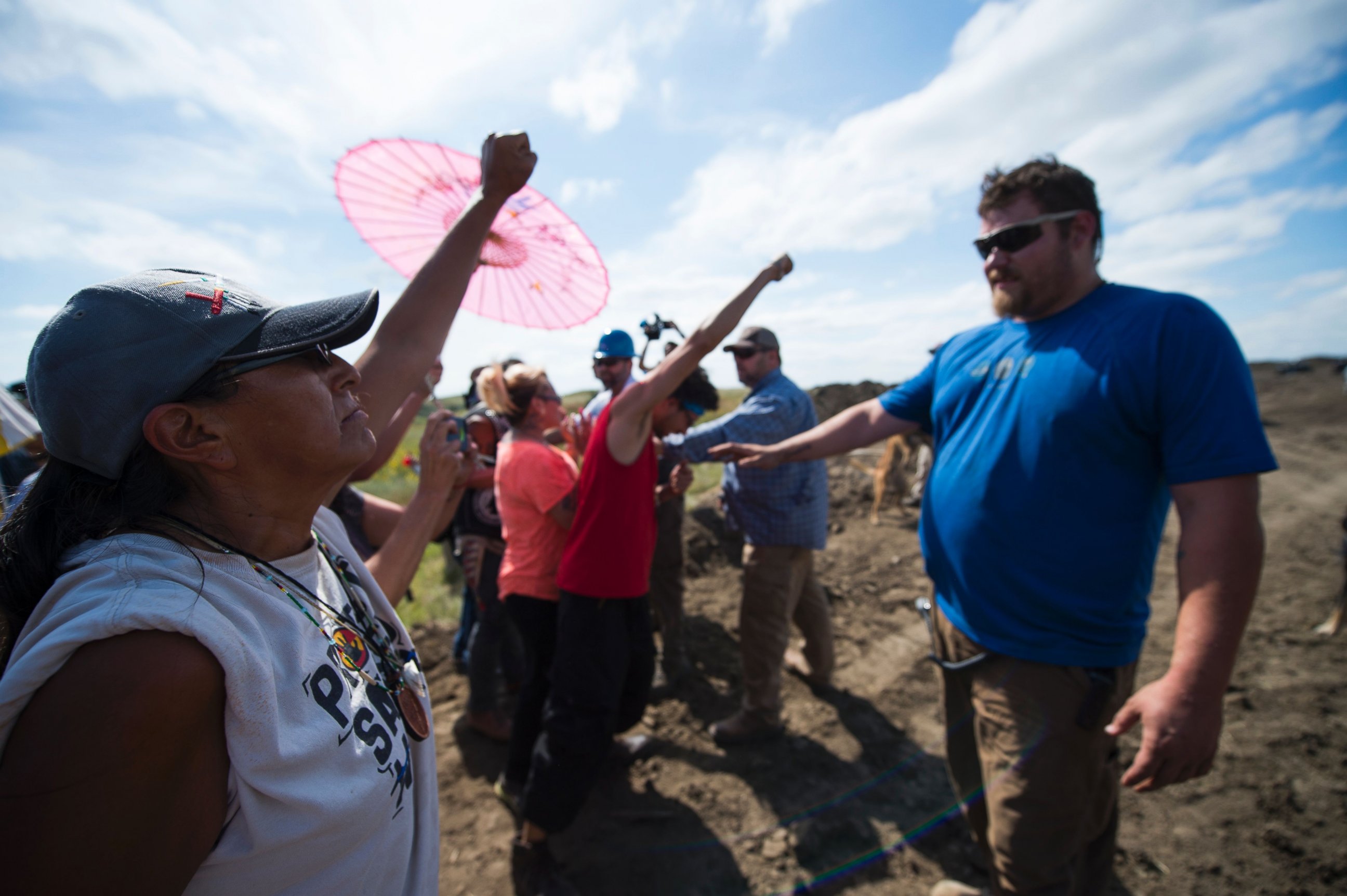 PHOTO: Security agents, right, confront protestors on the worksite for the Dakota Access Pipeline (DAPL) oil pipeline, near Cannonball, North Dakota, Sept. 3, 2016.