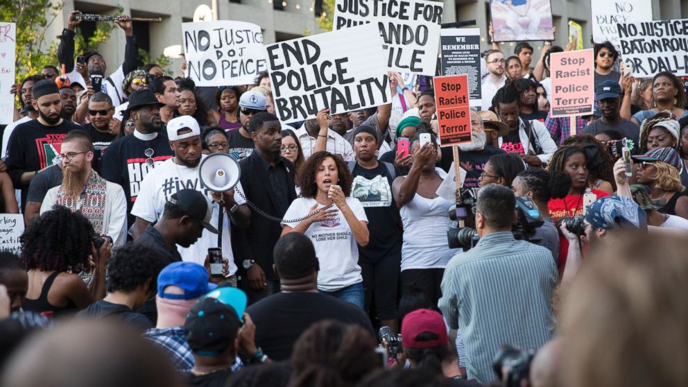 People rally in Dallas, July 7, 2016 to protest the deaths of Alton Sterling and Philando Castile.
