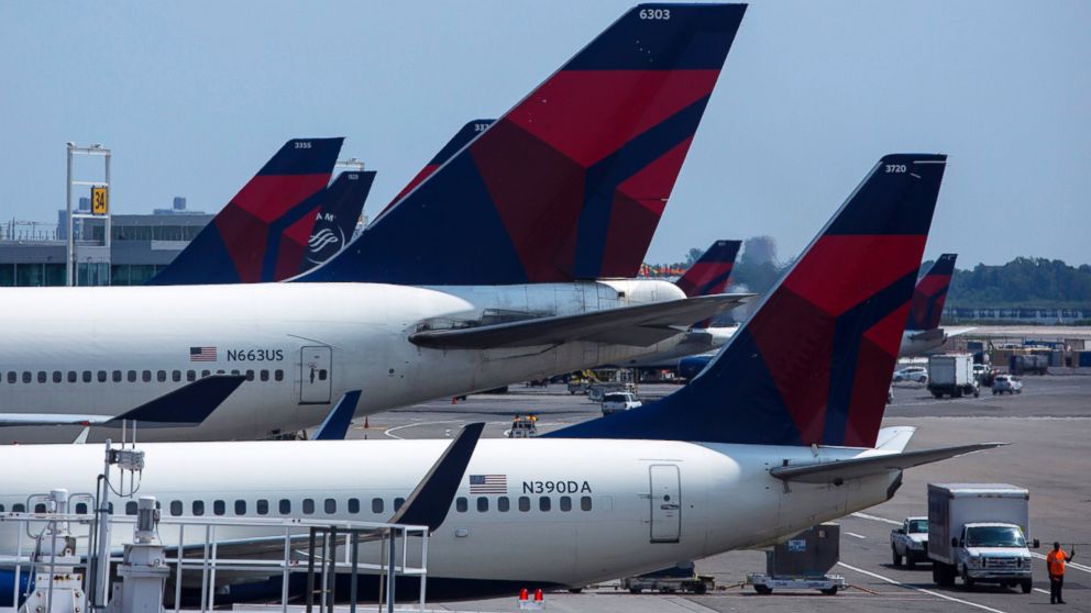 Delta Airlines planes sit at Terminal 4 at John F. Kennedy Airport July 22, 2014 in New York City.