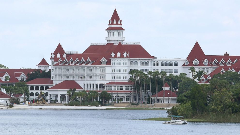 PHOTO: A boat belonging to the Orange County Sheriff's office searches the Seven Seas lagoon outside Disney's Grand Floridian Resort & Spa near Orlando, Fla., June 15, 2016. 
