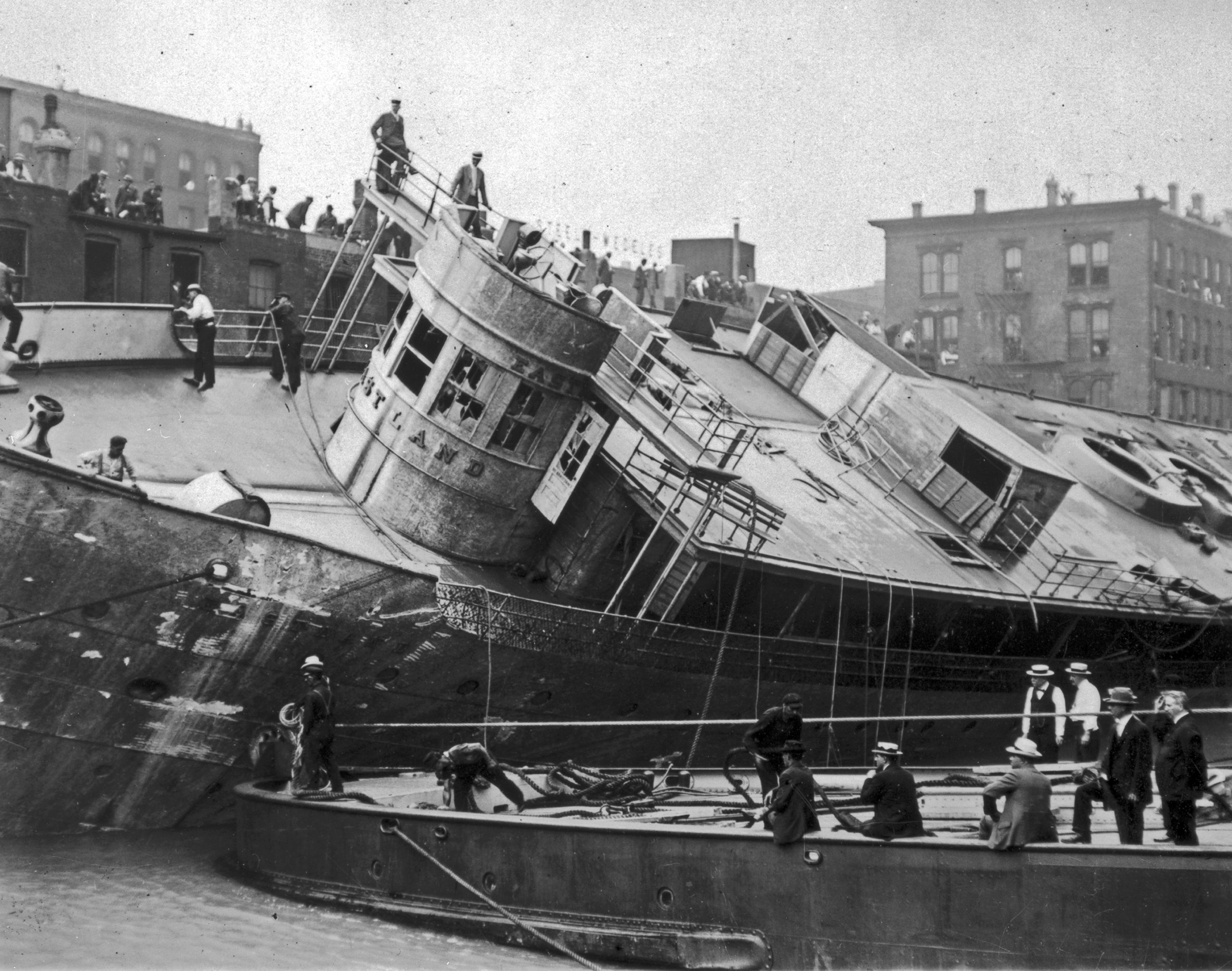 PHOTO: The Eastland ship being righted after the Eastland Disaster on the Chicago River, 1915.