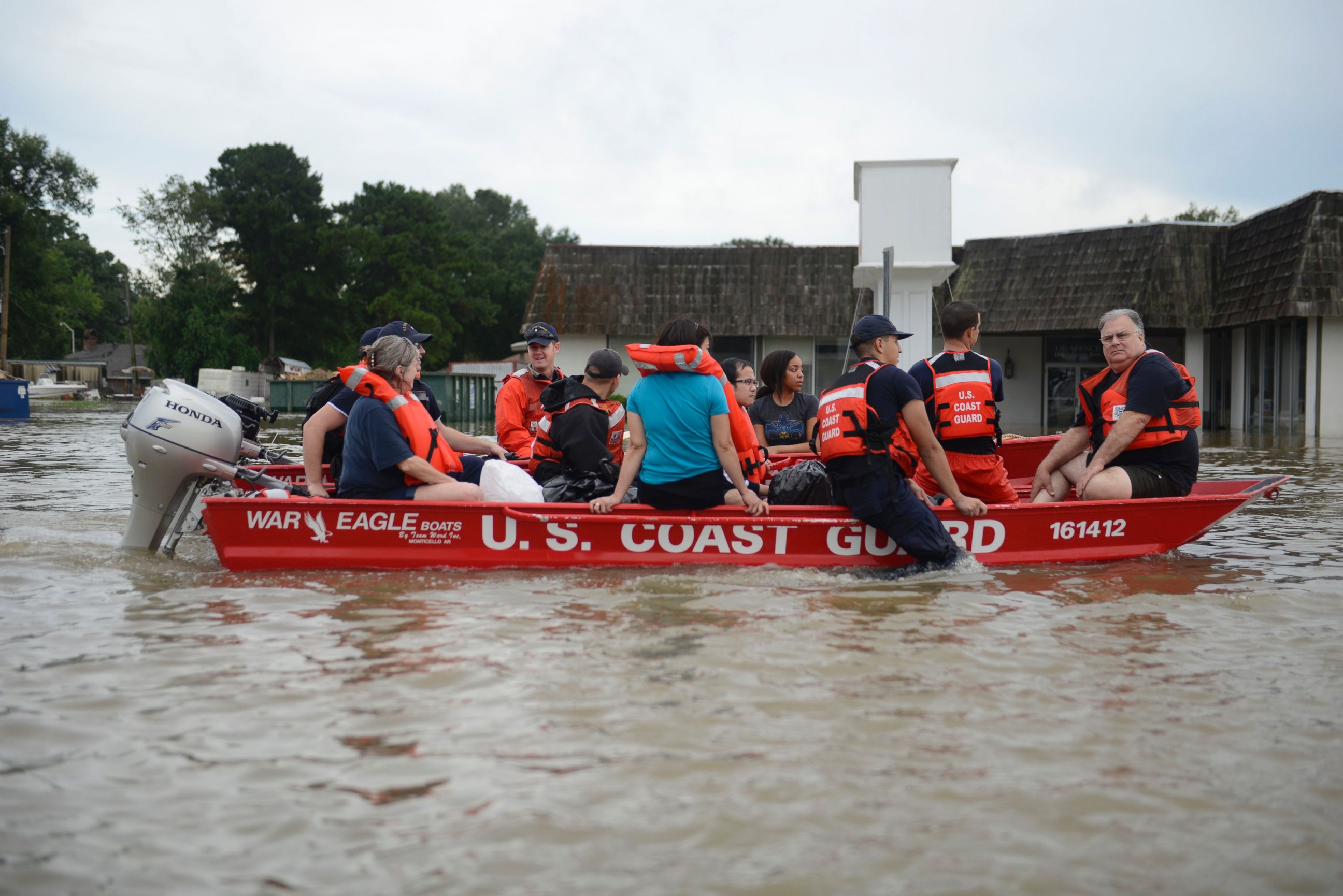 PHOTO: Coast Guard personnel evacuating people from a floodwaters in Baton Rouge, Louisiana, Aug. 14, 2016.  