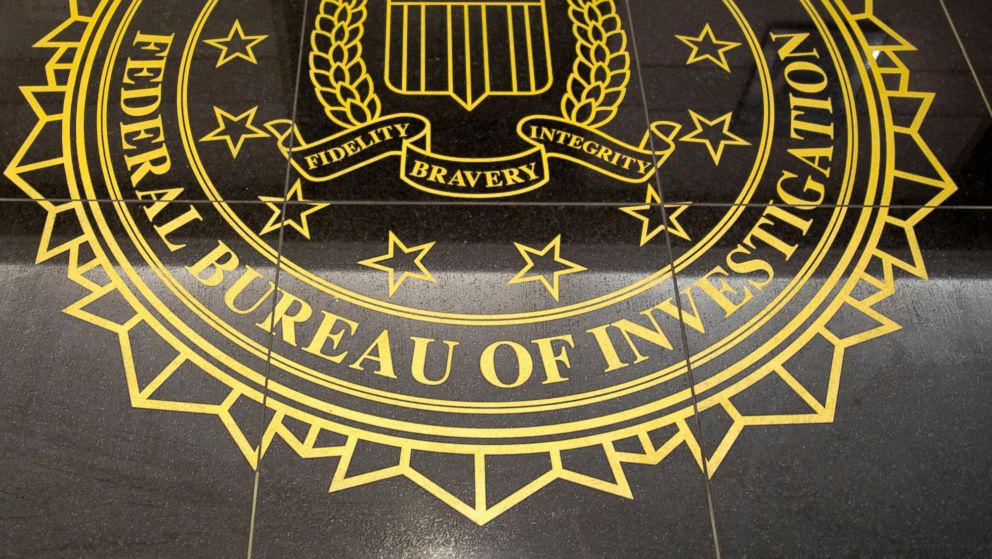 PHOTO: The seal of the Federal Bureau of Investigation is seen on the floor at the FBI's Washington field office in Washington, D.C. on March 13, 2014. 