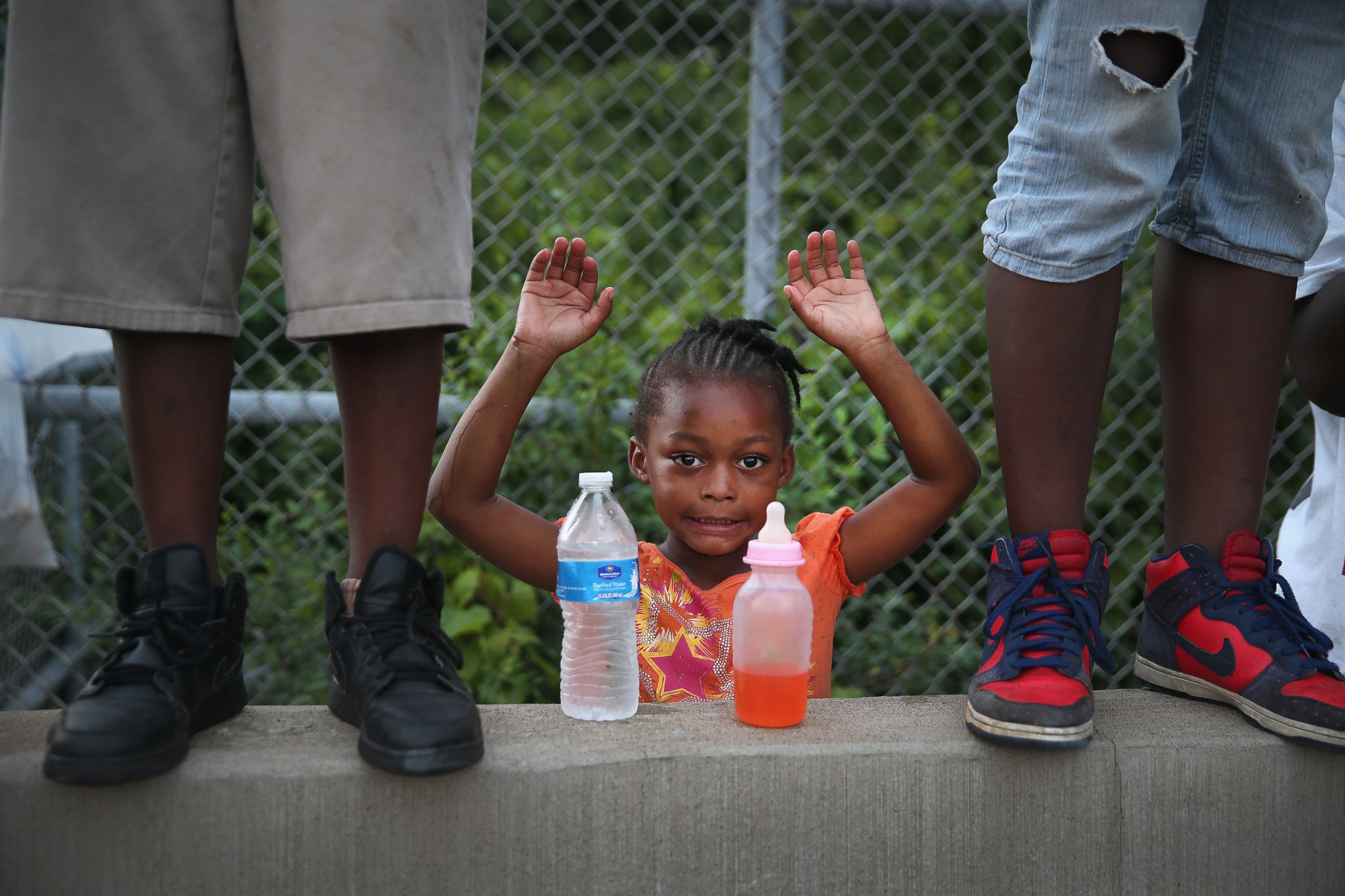 PHOTO: Gabrielle Walker, 5, protests the killing of Michael Brown on Aug. 17, 2014 in Ferguson, Mo.  