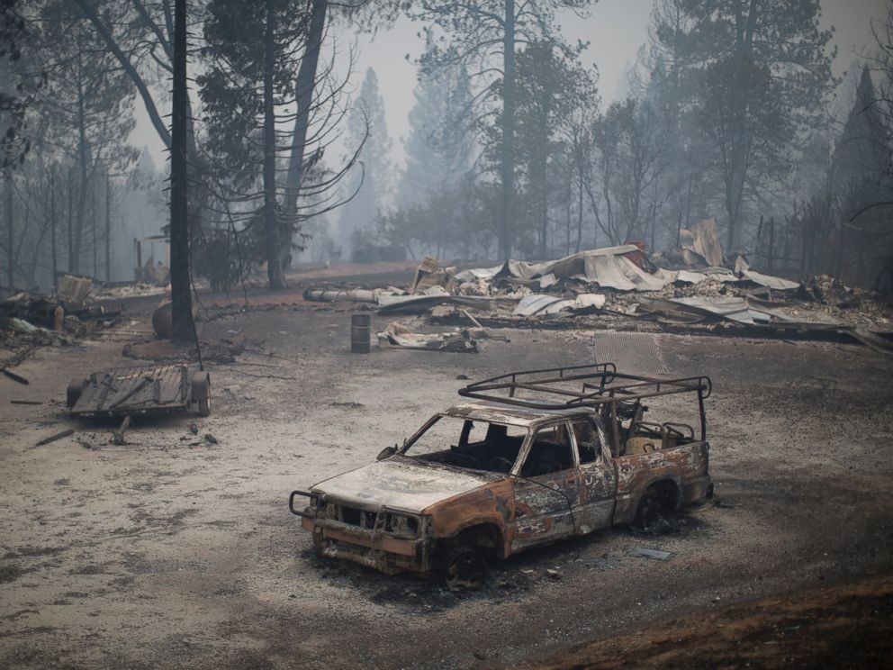 PHOTO: A burned truck and structures are seen at the Butte Fire, Sept. 13, 2015 near San Andreas, Calif.