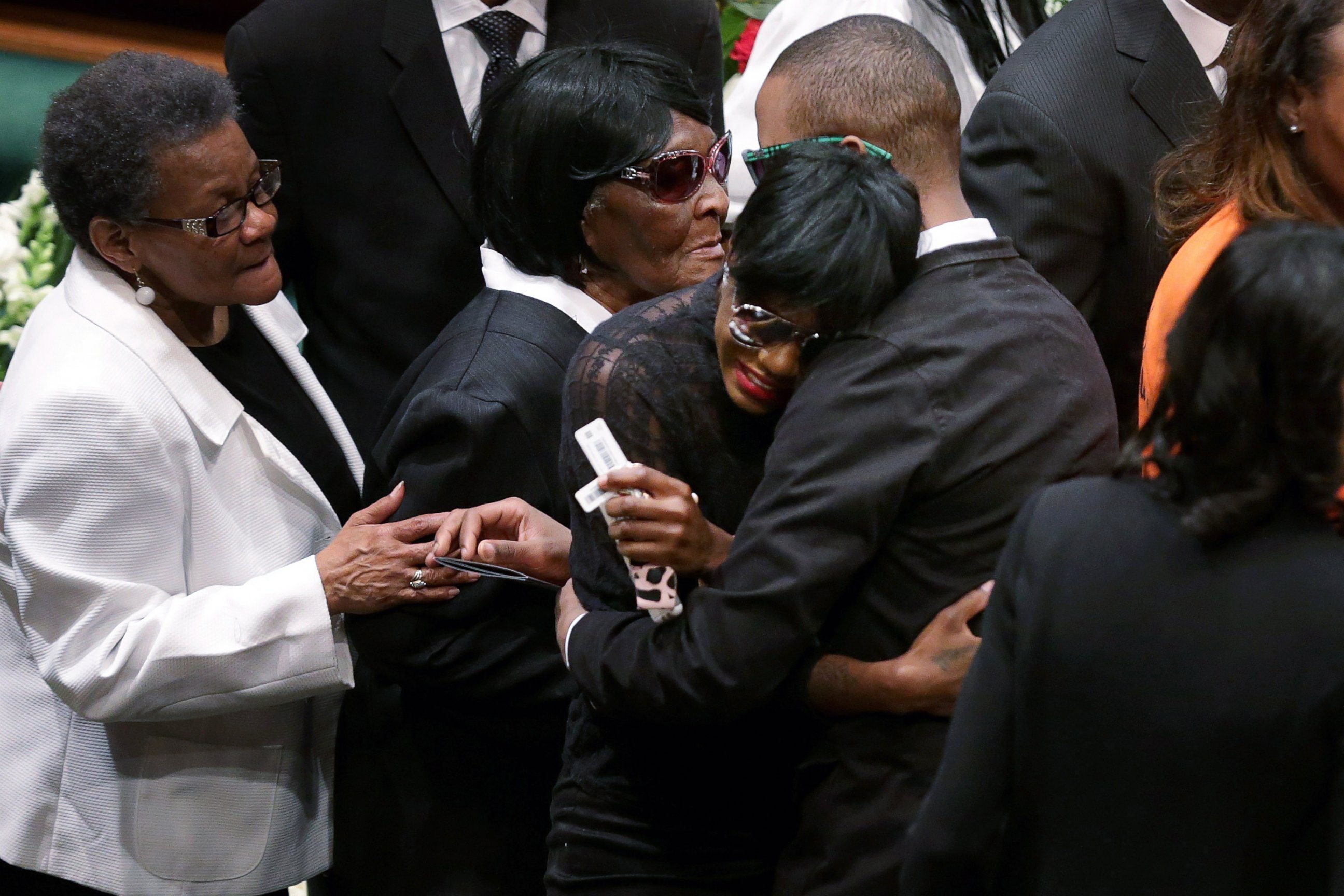 PHOTO: Freddie Gray's twin sister Fredericka Gray is embraced by family and supporters during her brother's funeral the New Shiloh Baptist Church during his funeral in Baltimore, April 27, 2015.