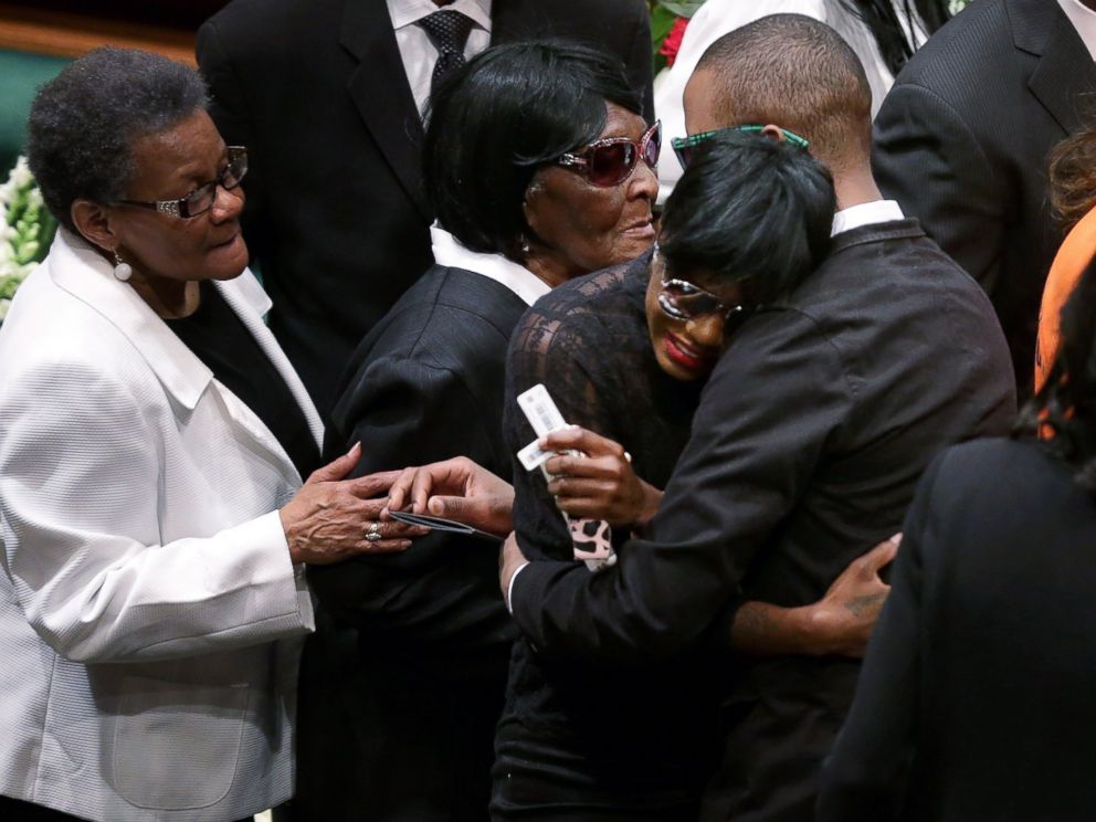 PHOTO: Freddie Grays twin sister Fredericka Gray is embraced by family and supporters during her brothers funeral the New Shiloh Baptist Church during his funeral in Baltimore, April 27, 2015.